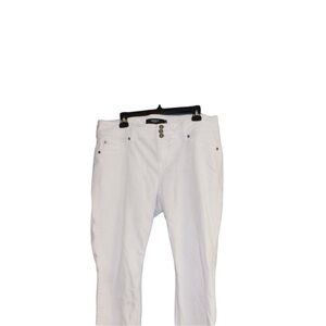 Three button white Torrid jegging pants. Women's size 16R.